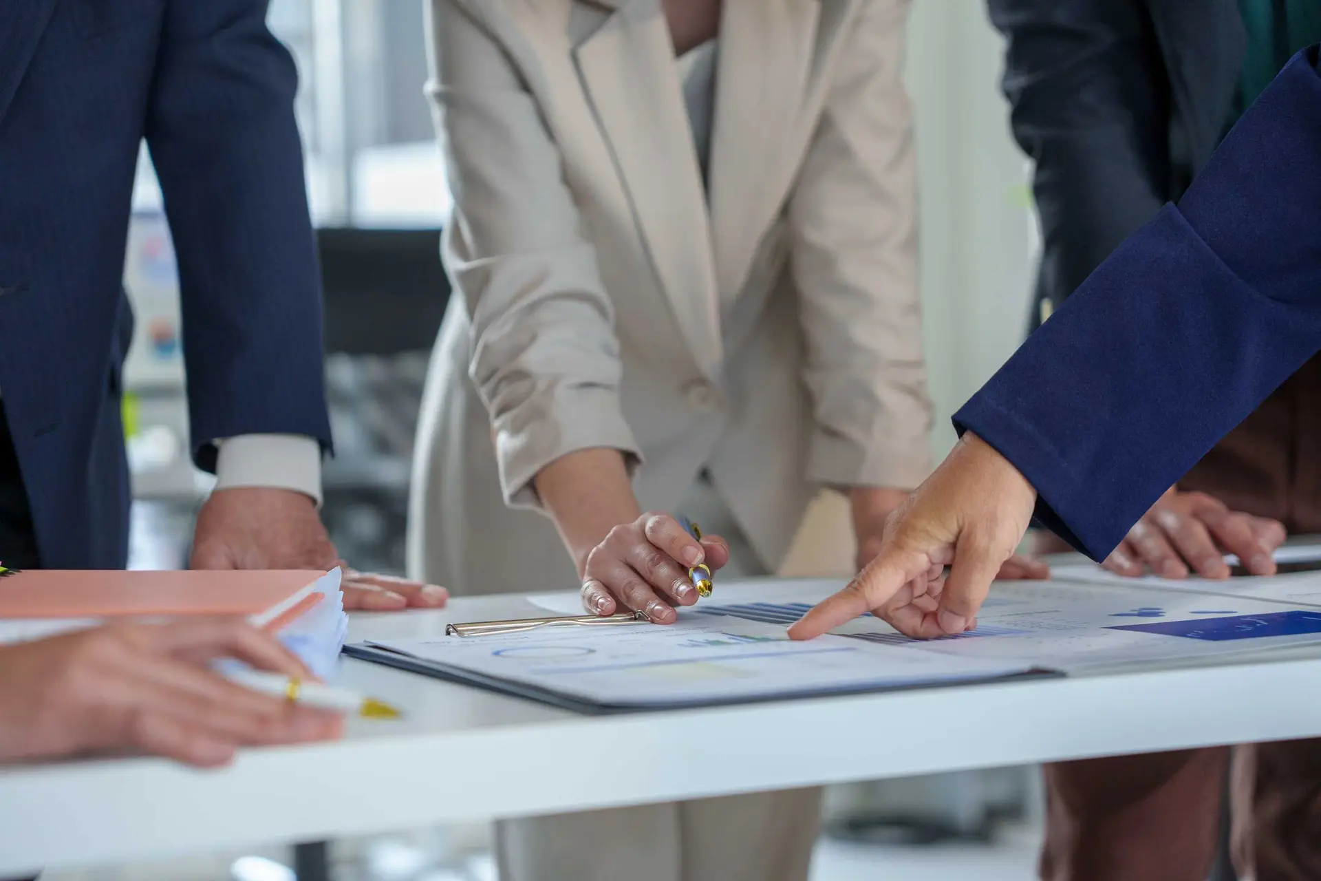 Financial services team reviewing low-code governance strategy, compliance planning, Microsoft Dynamics 365 governance framework, risk management, and Dynamics Monk expertise.